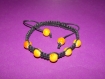 Bracelet noir perle en verre jaune marbré 