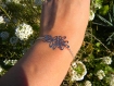 Bracelet argenté fleur filigrane 