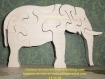 Puzzle elephant en bois d'erable trompe en bas 