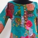 Longue tunique femme en coton vert imprimé exotic multicolore, col rond et boutons 