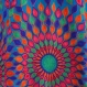 Tunique poncho en laine tissée bleue et brodée de dessins rosaces multicolores , col rond ,manches courtes 