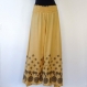 Pantalon ample papillon en viscose beige, imprimé motifs ethniques noirs , élastiqué à la taille 