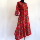 Longue robe tunique fuchsia et multicolore , manches 3/4, col rond, boutonnée sur le devant , évasée dans le bas 