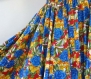 Robe bustier en coton à fleurs exubérantes , top smocké sur jupe 45 pans 