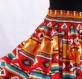 Jupe mi- longue à motif ethnique multicolores et ceinture muticolore élastiquée à la taille 
