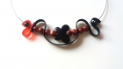 Collier sangle silicone noir et rouge, papillon noir,perles rouges et noires 