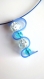 Boucles d'oreilles perles bleues, transparentes craquelées, sangle silicone bleu 
