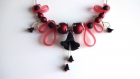 Collier fleurs noires,perles magique noires et rouges,sangle silicone 
