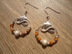 Créoles avec des perles tchèques à facettes orange picasso métal argenté 