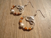 Créoles avec des perles tchèques à facettes orange picasso métal argenté 