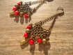 Boucles avec des perles semi-précieuses de jade rouge sang 