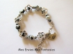 Kit bracelet dalmatien perles noir et blanc et cadre a perle fleur 