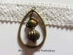 1 breloque / pendentif goutte 4.8cm : perles magique vert et jaune et cage a perle 
