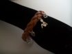 Bracelet marron cuir tressé avec pendants 