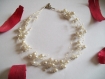 Trés beau collier en perle blanche 