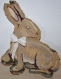 Coussin à poser "lapin élégant" en tapisserie ancienne. 