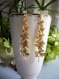 Boucles d'oreille cascade de fleurs en plaqué or 