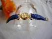 Bracelet bleu simili cuir et métal doré 