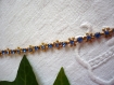 Collier fleurs cristal bleu et métal doré 