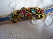 Bracelet cuir et cabochons multicolores fermoir vieil or 