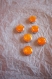 Perles forme pastille coloris orange pailleté