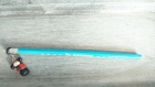 Crayon à papier kokeishi en fimo sur crayon turquoise 