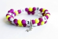 Bracelet d'allaitement sur fil à mémoire de forme de 55mm avec perles en acrylique de couleur violet et jaune 