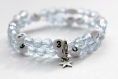 Bracelet d'allaitement sur fil à mémoire de forme de 55mm avec perles en acrylique de couleur bleu claire 
