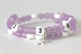 Bracelet d'allaitement sur fil à mémoire de forme de 55mm avec perles en acrylique de couleur violet 