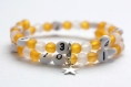 Bracelet d'allaitement sur fil à mémoire de forme de 55mm avec perles en acrylique de couleur orange et blanc 