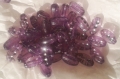 Perles ovales mauves décorées de 3 strass incluses. lot de 50 perles 