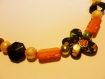 Collier monté sur câble perles variées (papillon, noir, or, orange) 