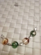 Collier monté sur câble perles en verre et métal 