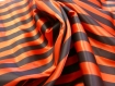 Coupon de tissu carnaval en polyester rayé noir et rouge 