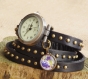 Montre bracelet trois tours cuir tressé et pendentif terre montre bracelet en cuir coloris noir 