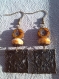 Boucles d'oreilles fleur orangé bohème et bronze 
