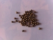 Lot de 60 perles en métal bronze d'un diamètre de 4mm 