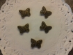 5 perles papillon en bronze 