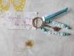 Porte clés en perles lettres design trio de rubans: "merci maître" idéal pour offrir 
