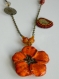 Collier couleurs chaudes automnales fleur en céramique et feuille en broderie de perles 