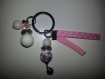 Bijoux de sac / porte clés rose pâle avec perle en céramique et grelot 