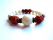 Bracelet vintage , pierres rouges et perles couleur crème 