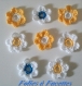 Fleurs jaunes d'or bleues et blanches au crochet en coton 