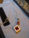Joli petit collier pendentif en howlite croix cristal rouge 