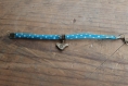 Bracelet " bird" en tissu turquoise à pois blanc 