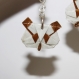 Boucles d'oreilles en origami en forme de tête de panda marron 