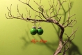 Boucle d'oreille de noël avec des boules verte 
