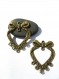 2 connecteurs bronze en forme coeur avec noeud 