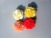 4 perles fleur en résine jaune,blanc, fuchsia, rose clair 18 mm 