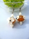 Boucles d'oreilles florales en perles de verre filé au chalumeau orange et blanche 